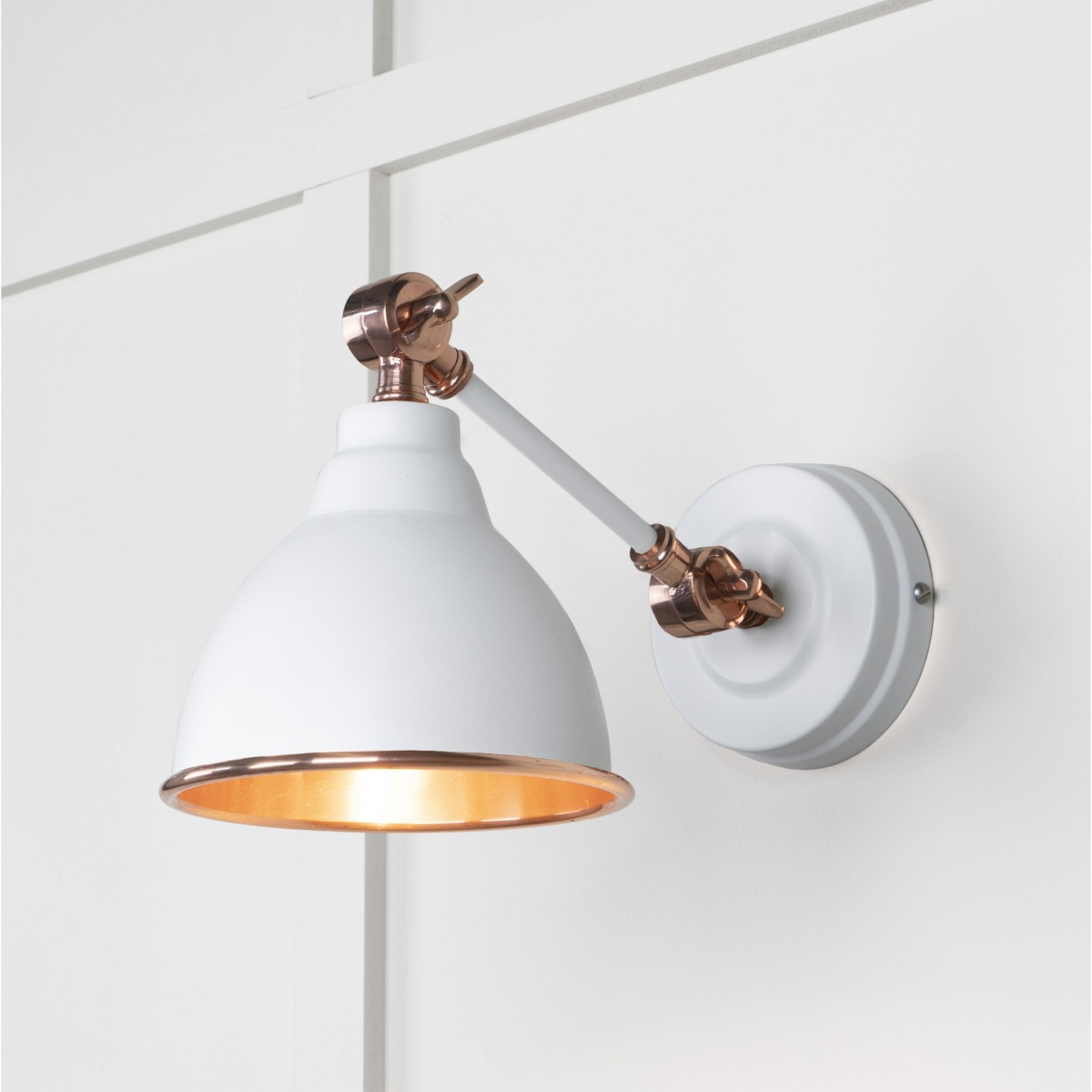 From the Anvil Smooth Copper Brindley Wall Light in Flock 49714SF