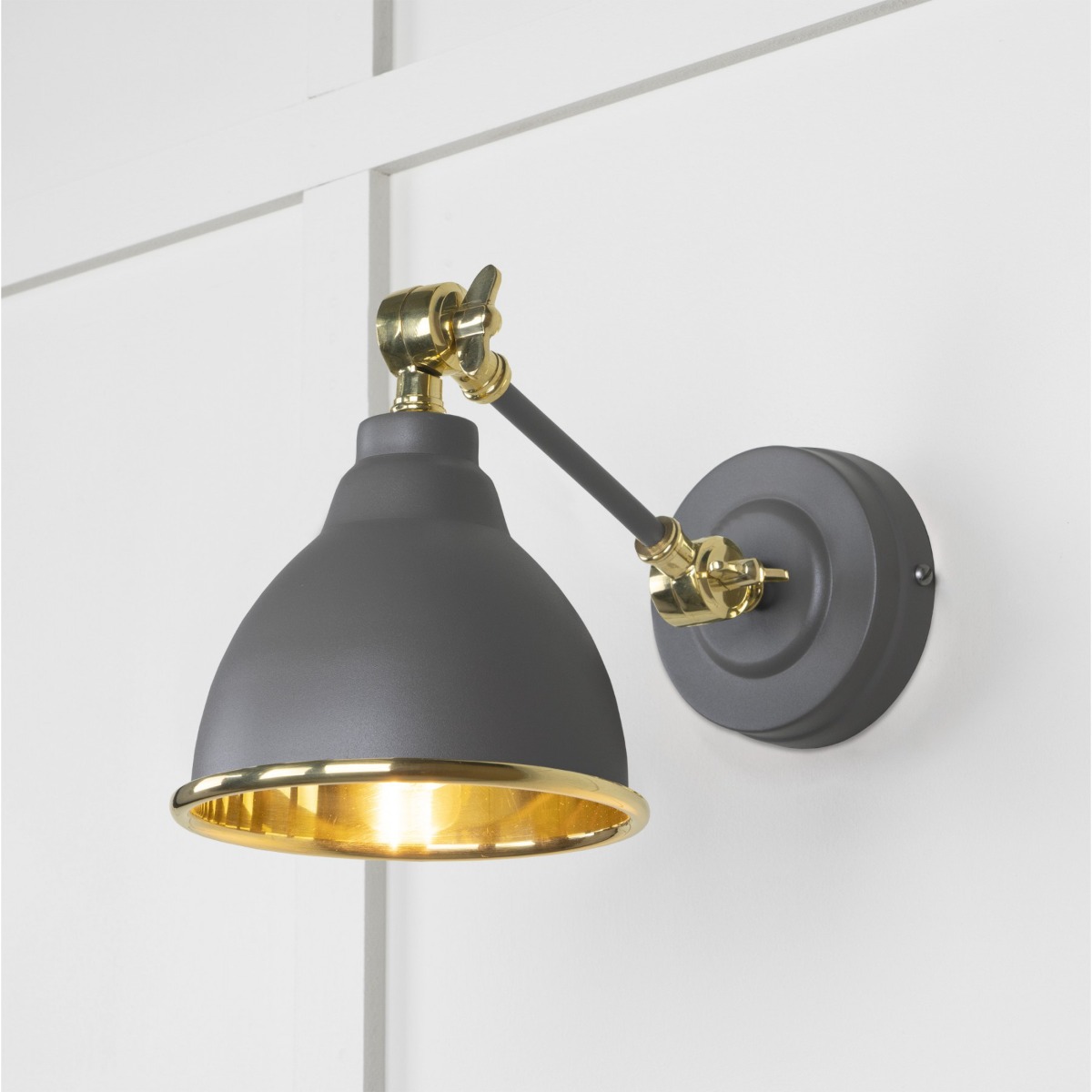 From the Anvil Smooth Brass Brindley Wall Light in Bluff 49716SBL