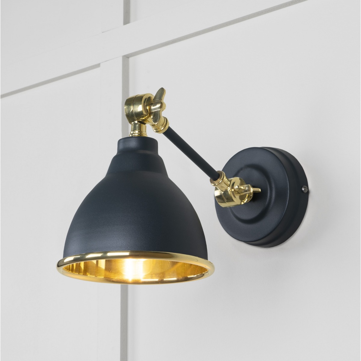 From the Anvil Smooth Brass Brindley Wall Light in Soot 49716SSO