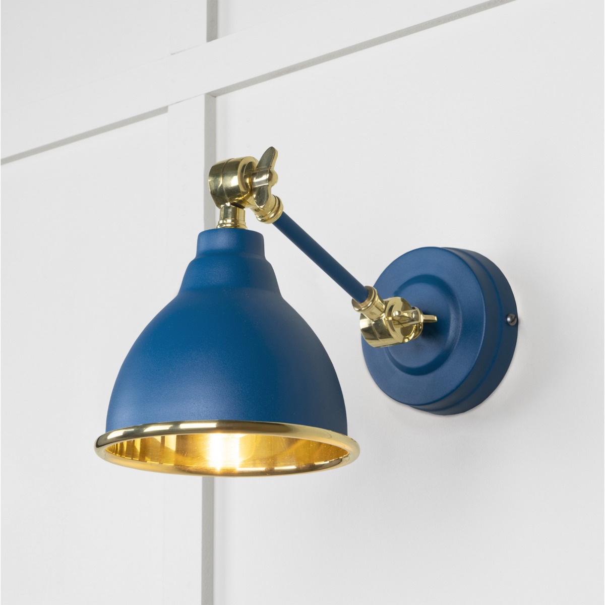 From the Anvil Smooth Brass Brindley Wall Light in Upstream 49716SU
