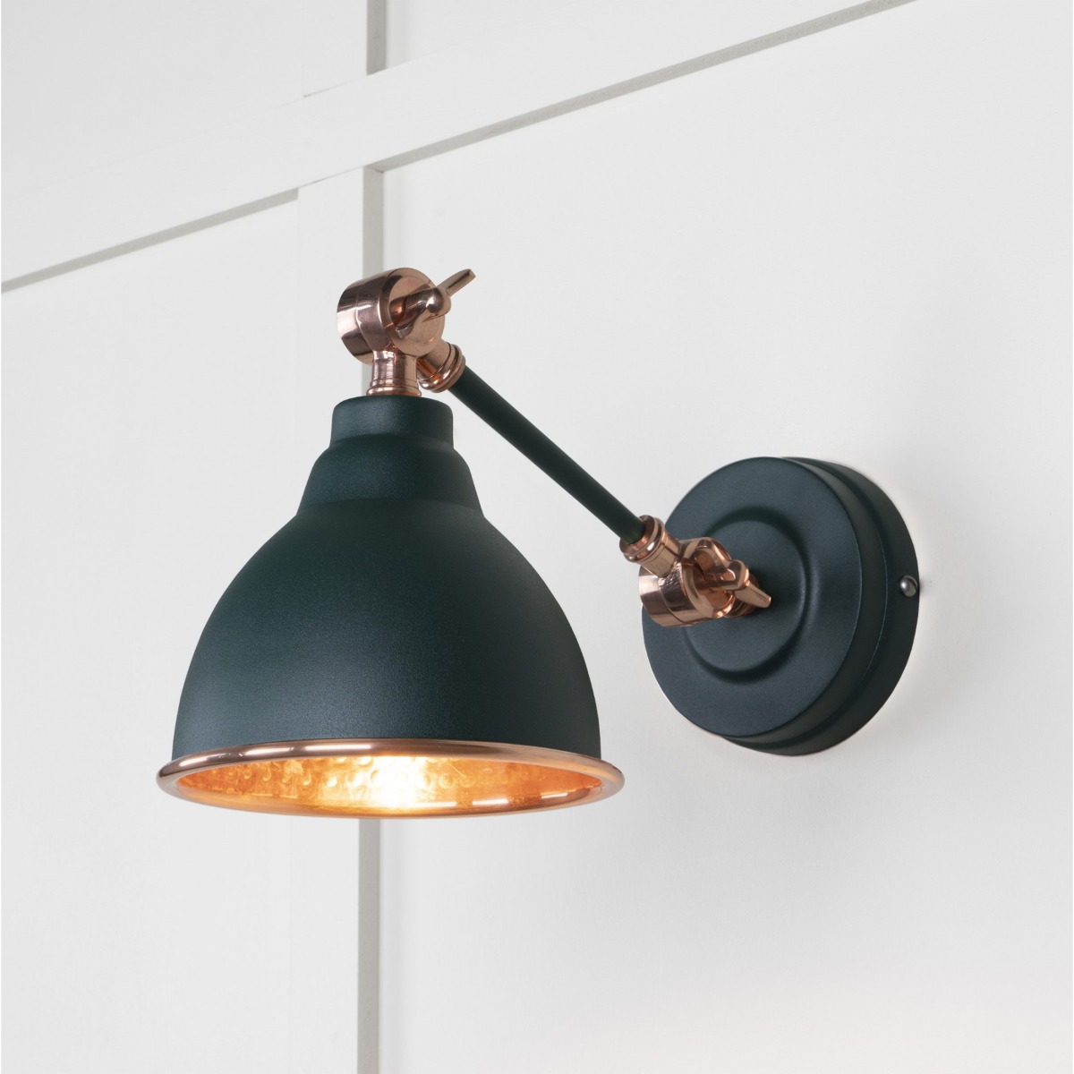 From the Anvil Hammered Copper Brindley Wall Light in Dingle 49717SDI