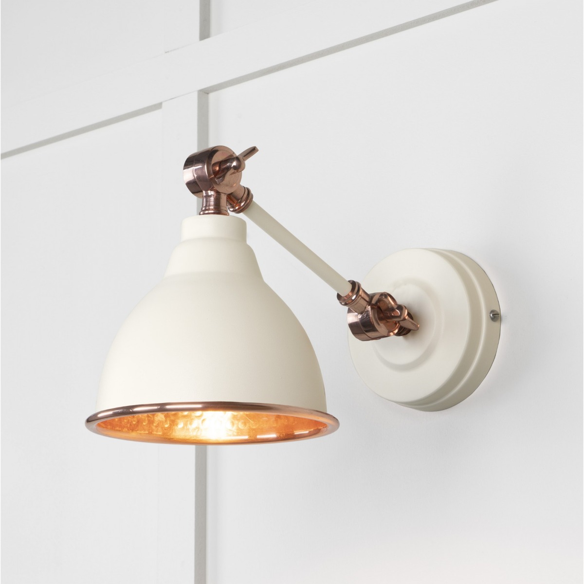 From the Anvil Hammered Copper Brindley Wall Light in Teasel 49717STE