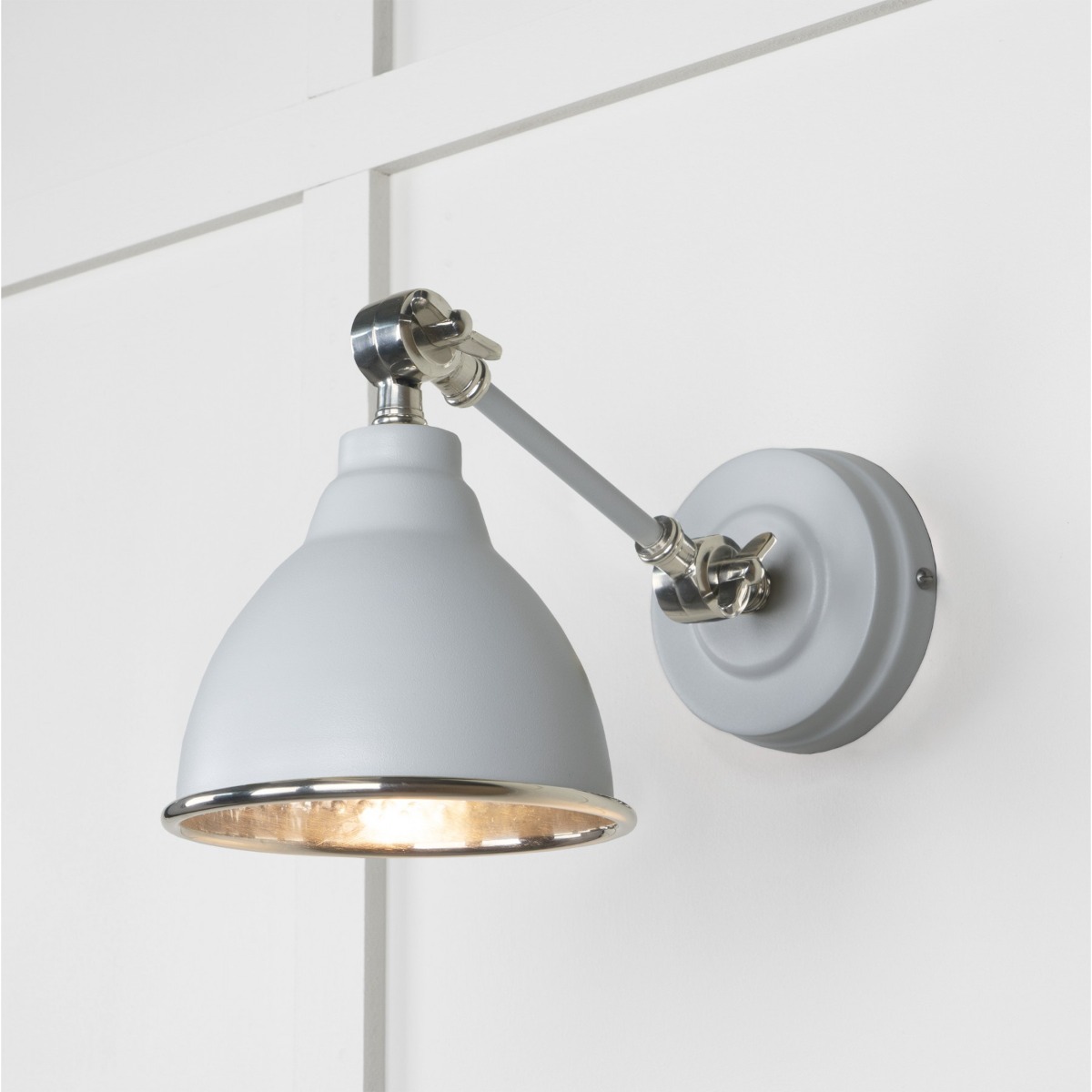 From the Anvil Hammered Nickel Brindley Wall Light in Birch 49718SBI