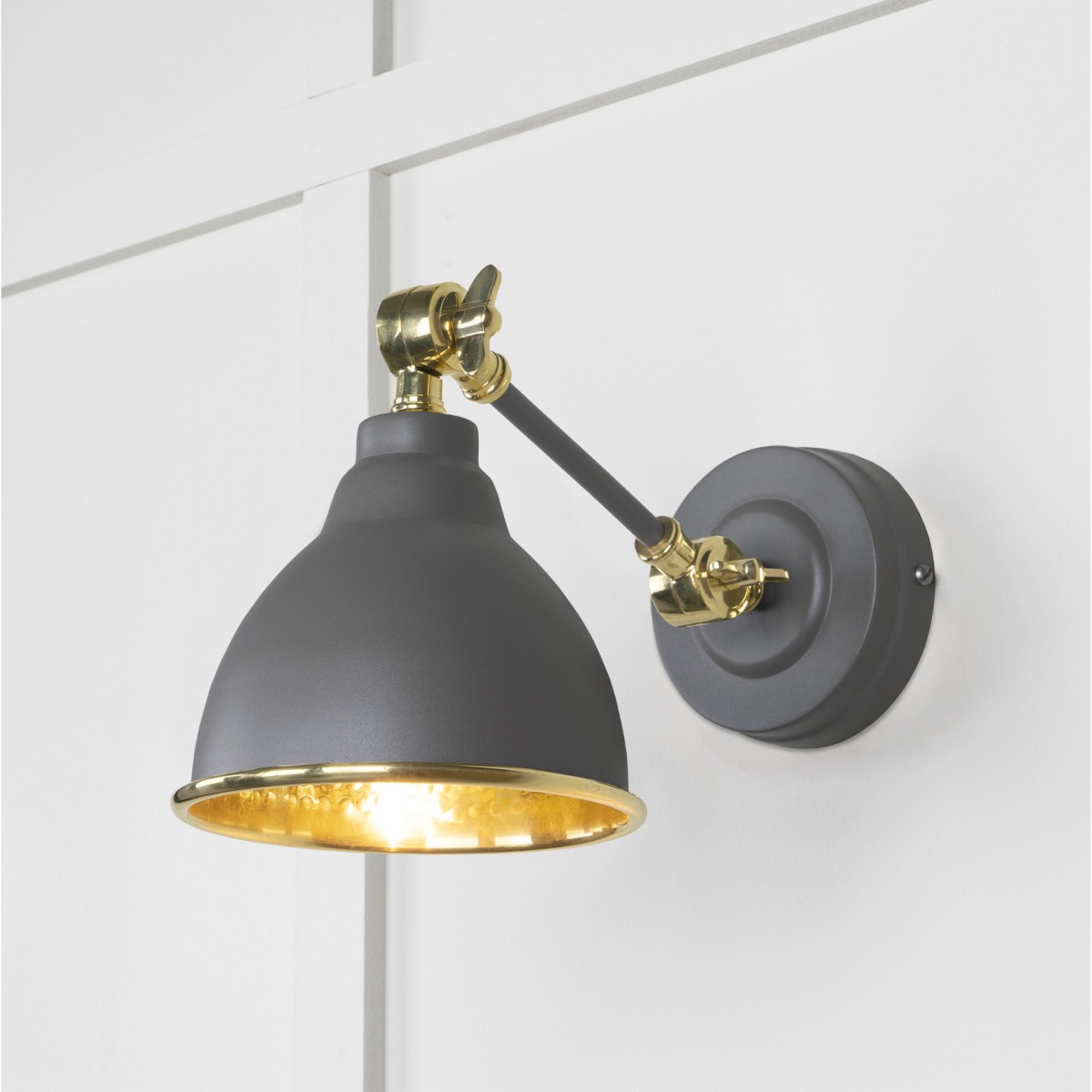 From the Anvil Hammered Brass Brindley Wall Light in Bluff 49719SBL