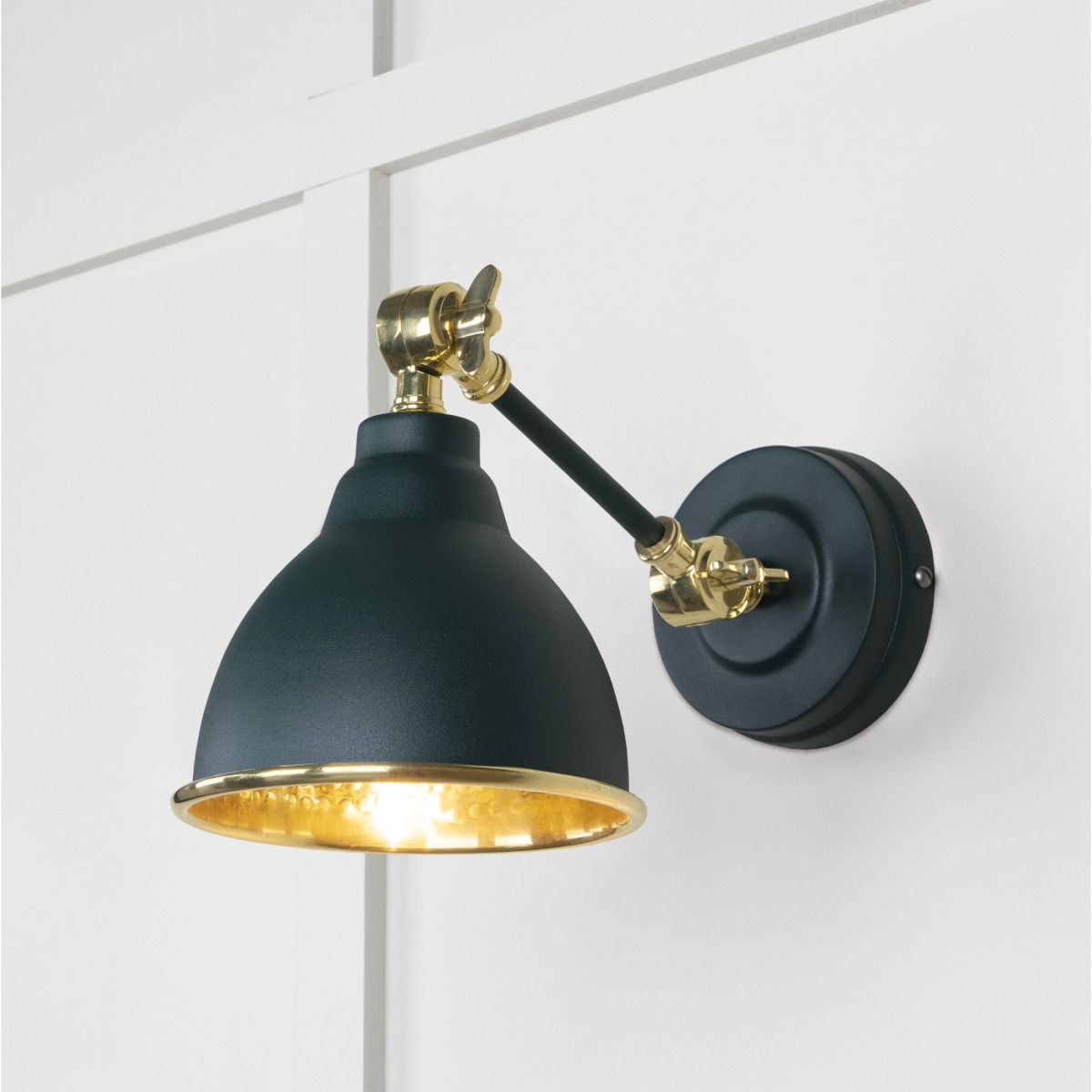 From the Anvil Hammered Brass Brindley Wall Light in Dingle 49719SDI