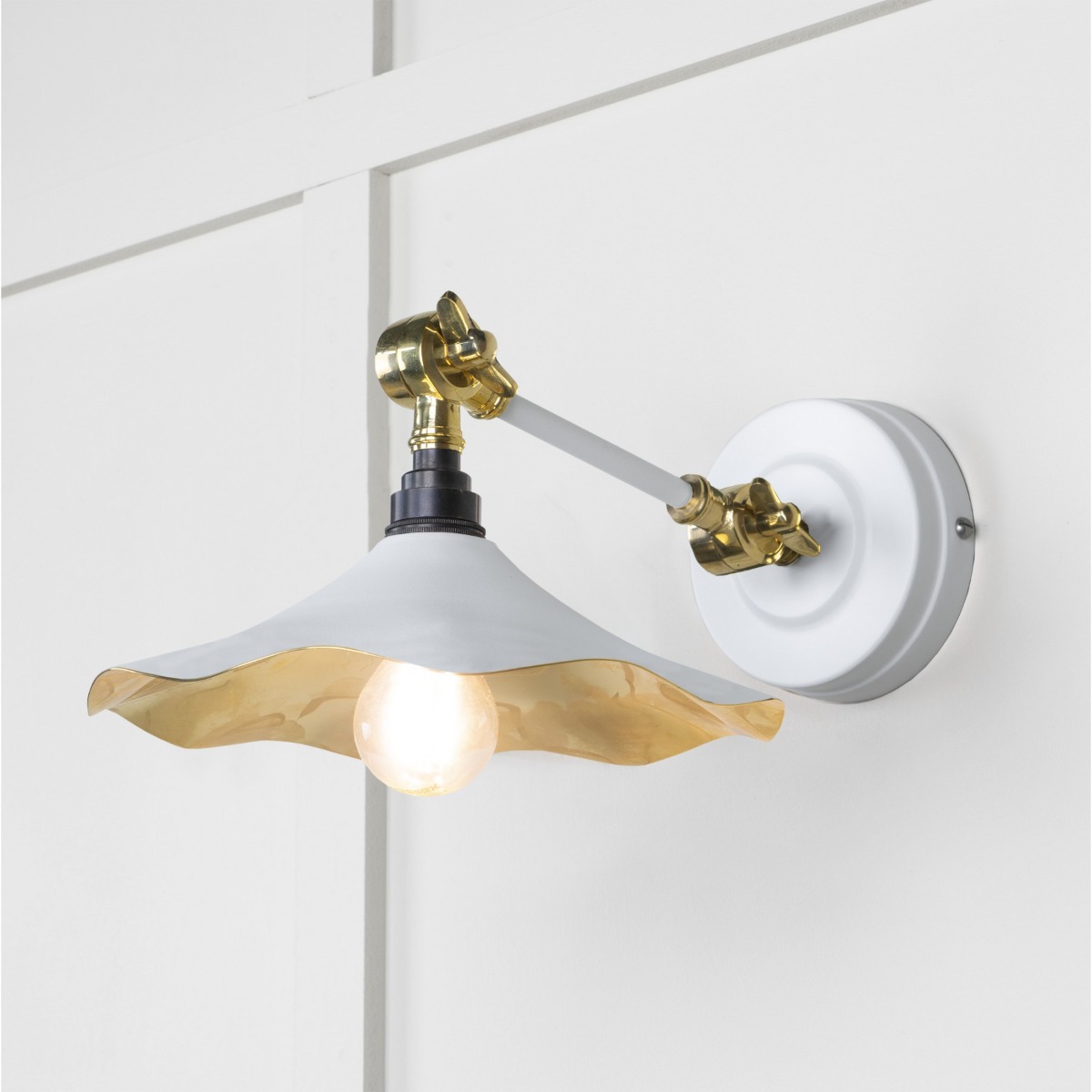 From the Anvil Smooth Brass Flora Wall Light in Flock 49725SF
