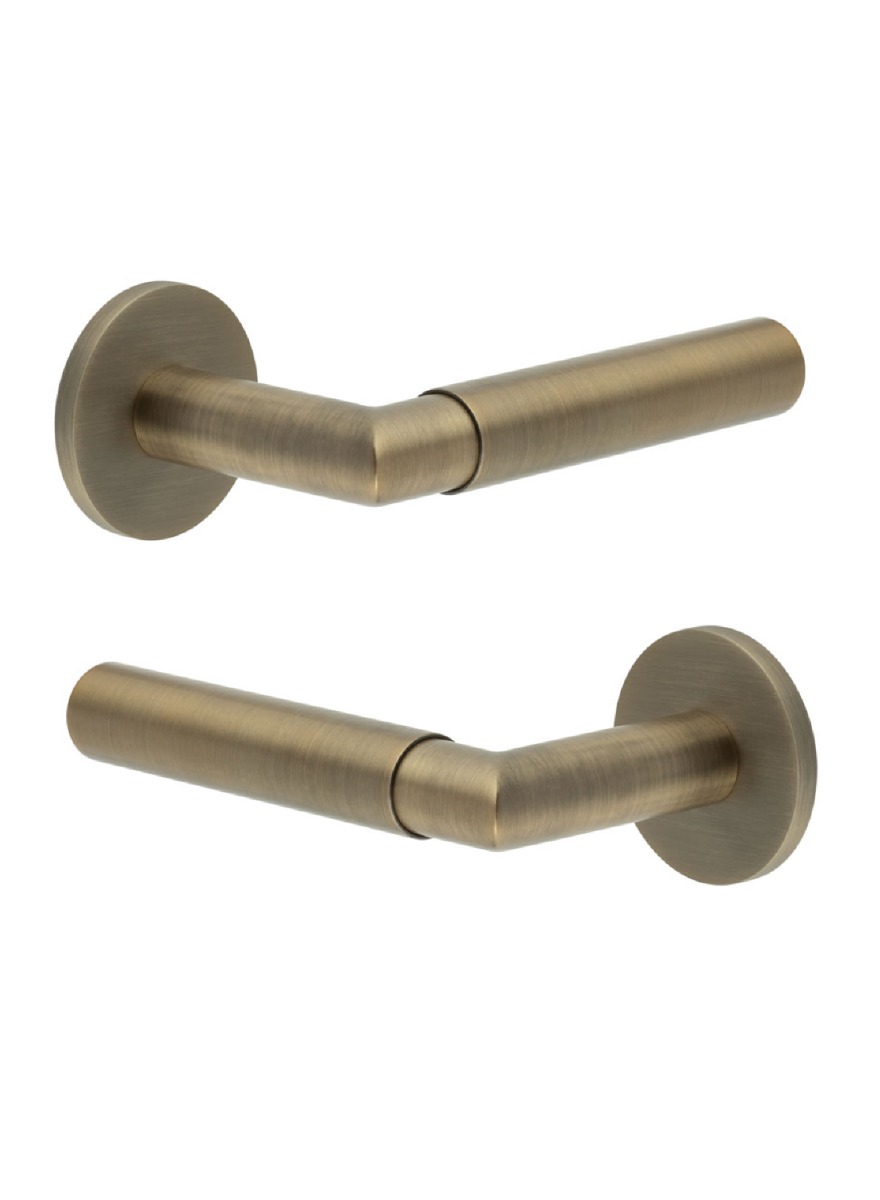 CR-102 Antique Brass Door Handle on Sprung Round Rose CR-102A1AB by Frelan