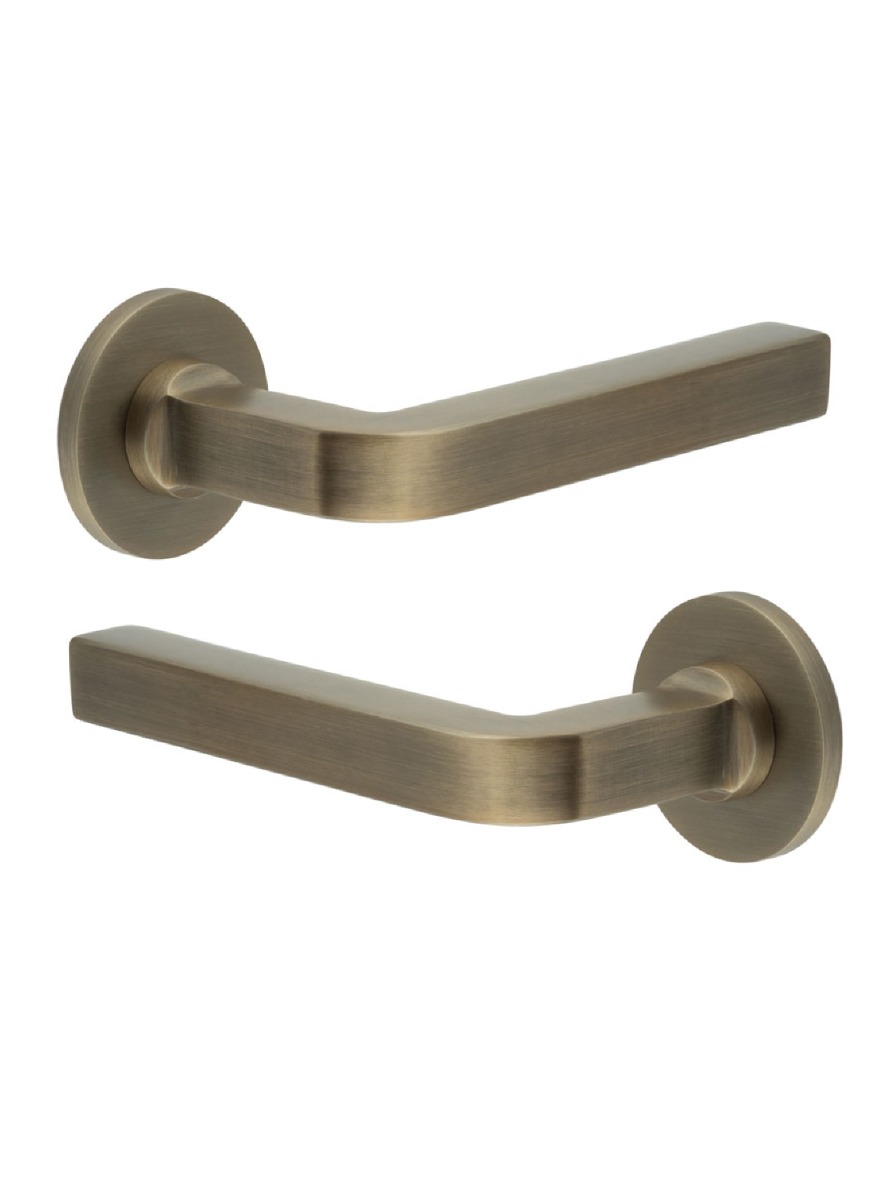 CR-104 Antique Brass Door Handle on Sprung Round Rose CR-104A1AB by Frelan