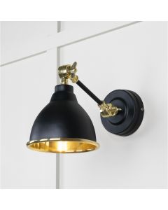 From the Anvil Smooth Brass Brindley Wall Light in Elan Black 49716SEB
