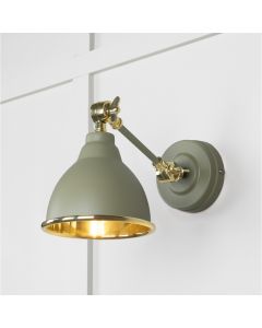 From the Anvil Smooth Brass Brindley Wall Light in Tump 49716STU