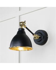 From the Anvil Hammered Brass Brindley Wall Light in Elan Black 49719SEB