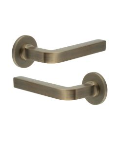 CR-104 Antique Brass Door Handle on Sprung Round Rose CR-104A1AB by Frelan