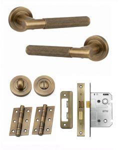 IRONZONE Marino Knurled Door Handle on Rose - Bathroom Pack - Antique Brass