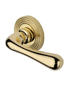 Heritage Brass Door Handle Lever Latch on Round Rose Charlbury Reeded Design Polished Brass 
  RR3022-PB