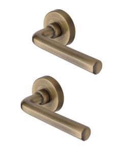 Heritage Brass Door Handle Lever Latch on Round Rose Octave Design Antique Brass   V4545-AT