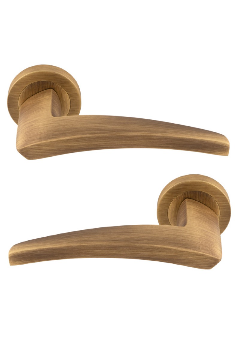 Manital Dune Door Handle on Round Rose - Antique Brass