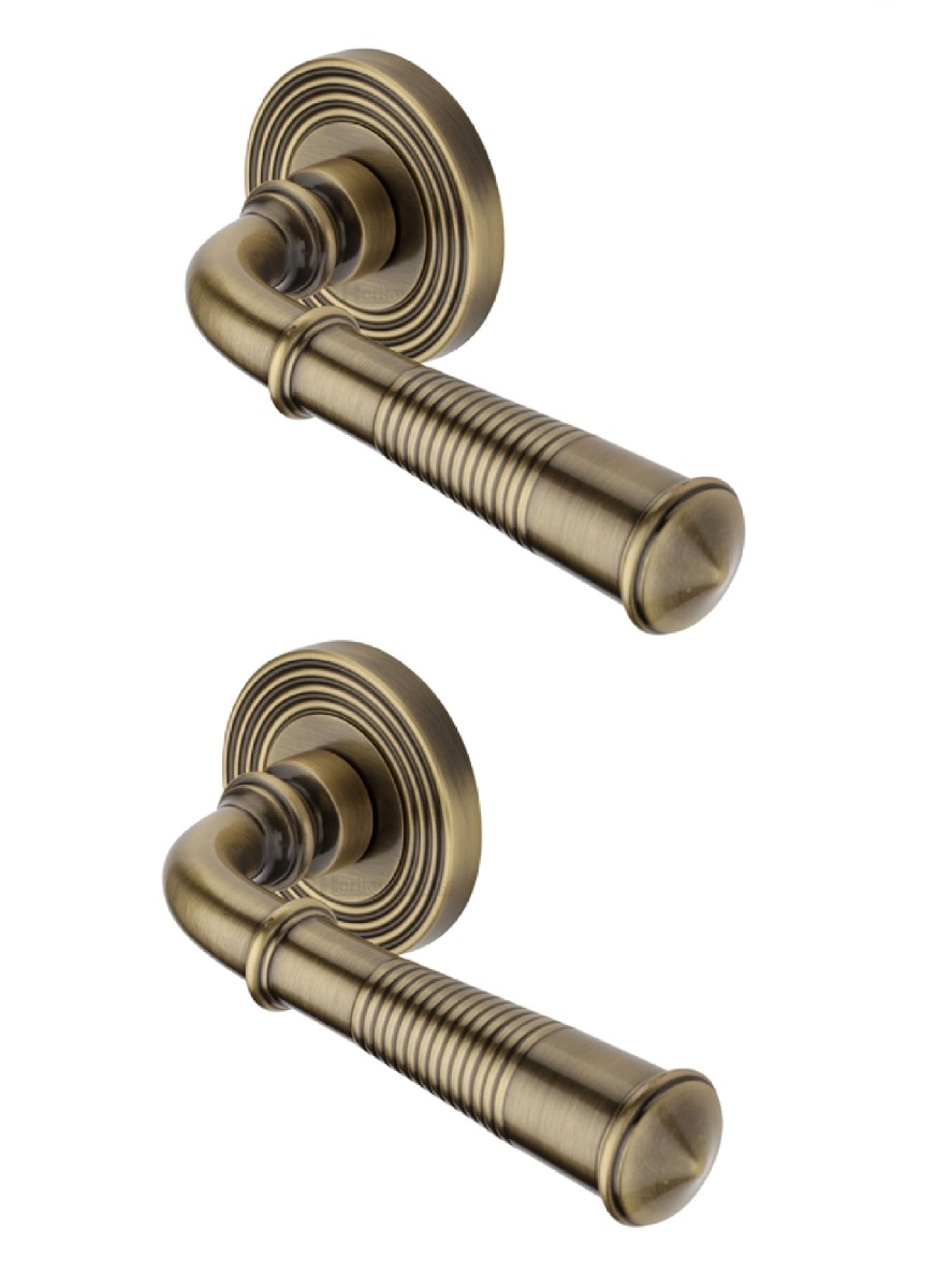 Heritage Brass Door Handle Lever Latch on Round Rose Bridgetown Reeded Design Antique Brass   RR1935-AT