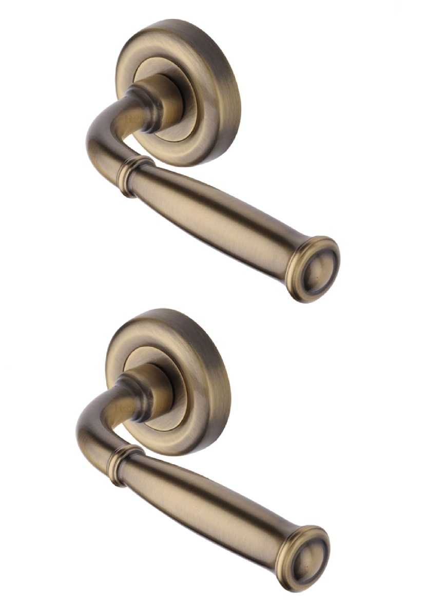 Heritage Brass Door Handle Lever Latch on Round Rose Lincoln Design Antique Brass   V1938-AT